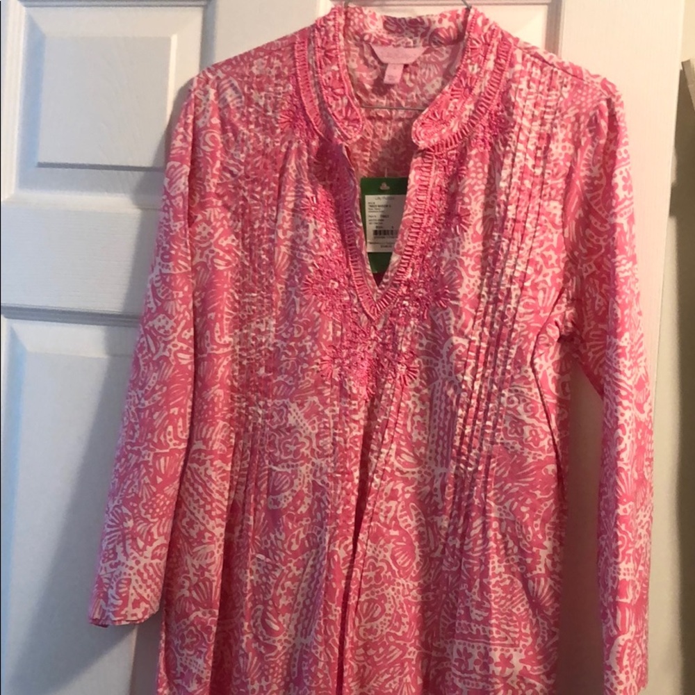 Brand new, never worn. Tags still attached